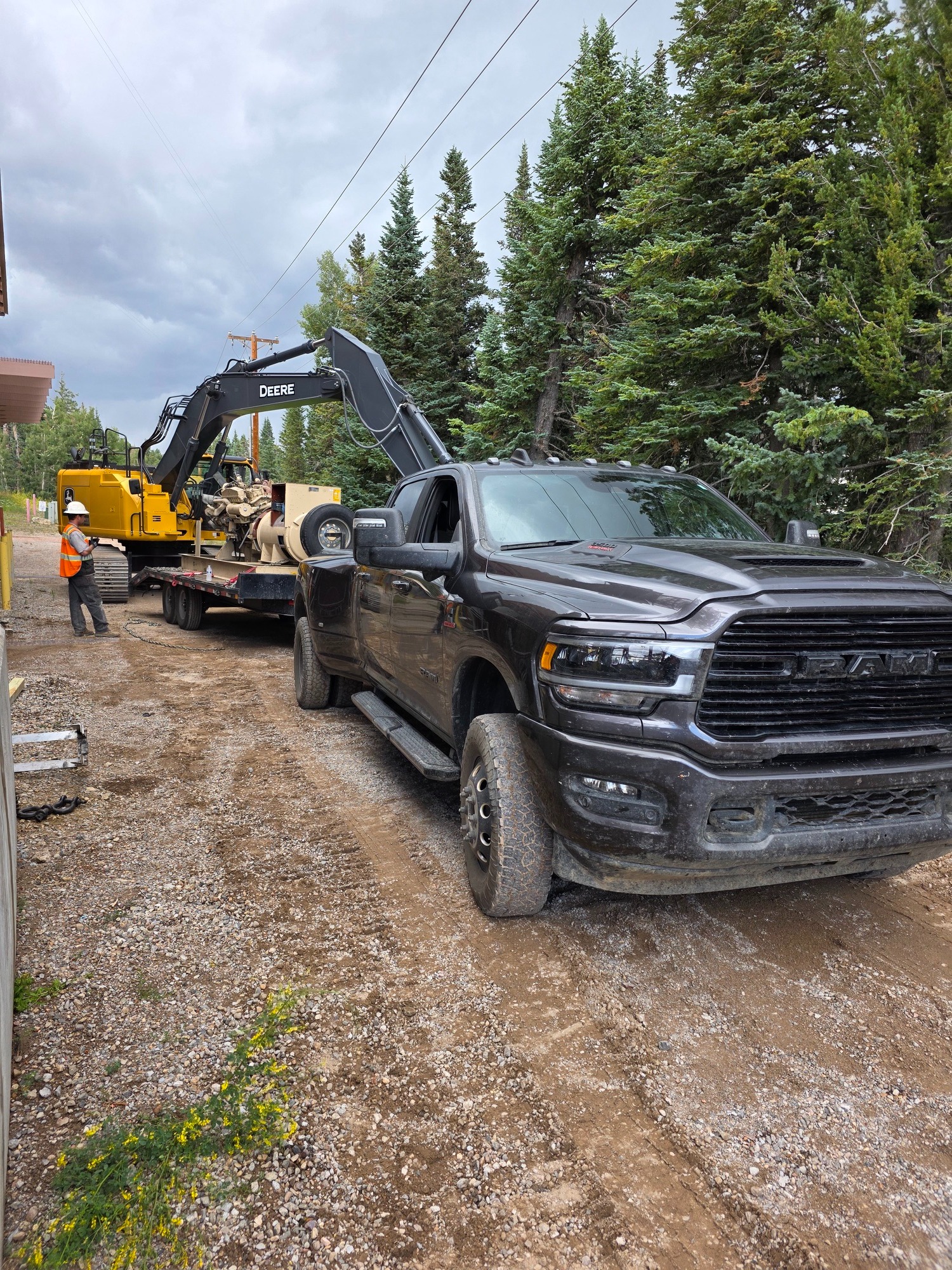 Construction equipment mobilized to a mountain jobsite